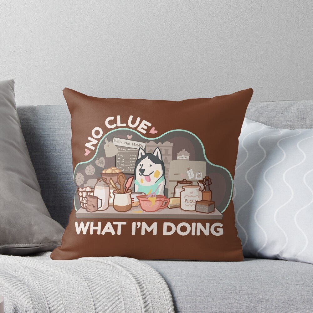 Decorative throw pillow on a couch featuring a cartoon illustration with text saying 